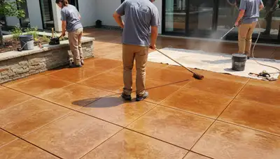 Professional concrete staining on patio surface in El Paso, TX with durable UV-resistant finish