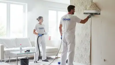 Professional wallpaper removal service in El Paso, TX preparing walls for fresh interior painting